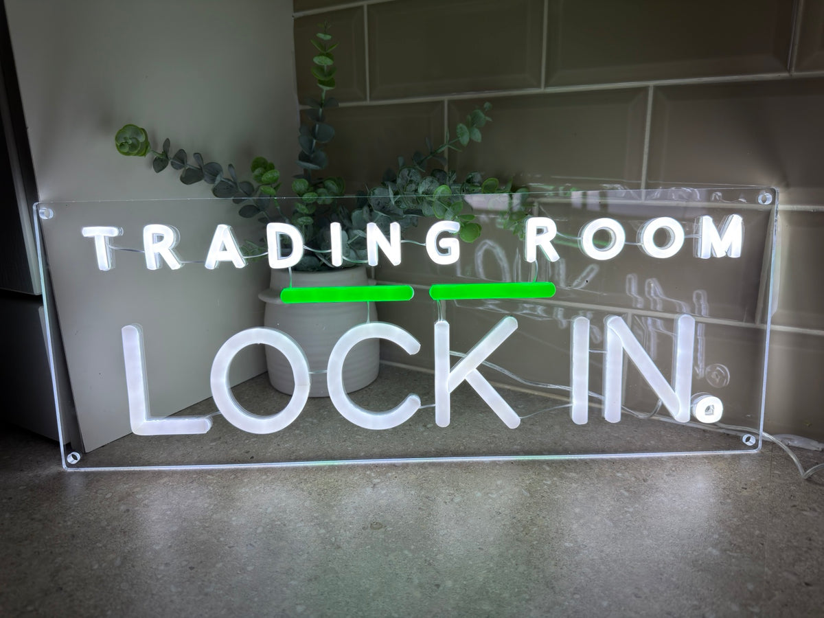 LOCK IN illuminated sign straight-on view with white letters green bars and clear acrylic